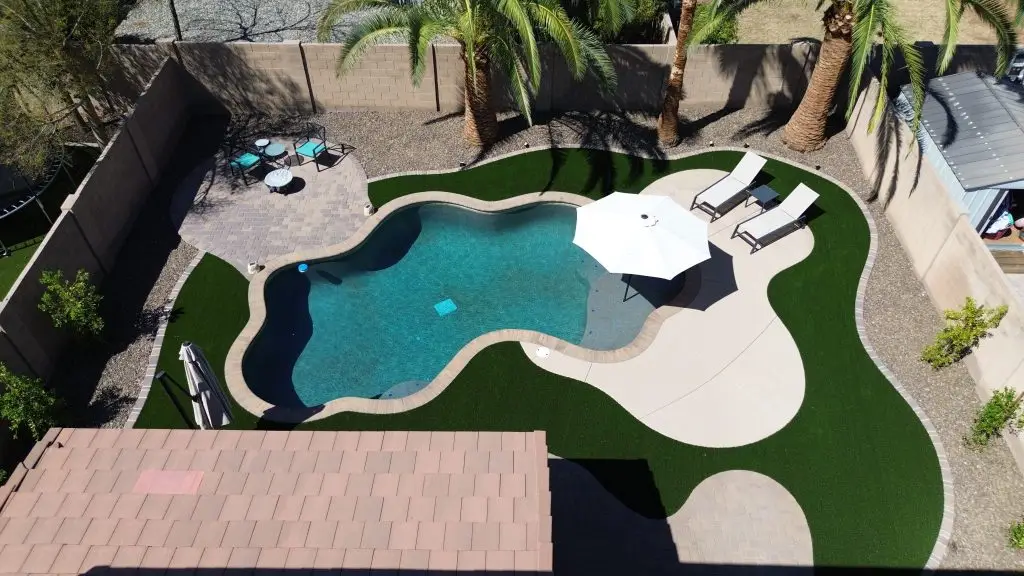 Stylish pool with lounge area.