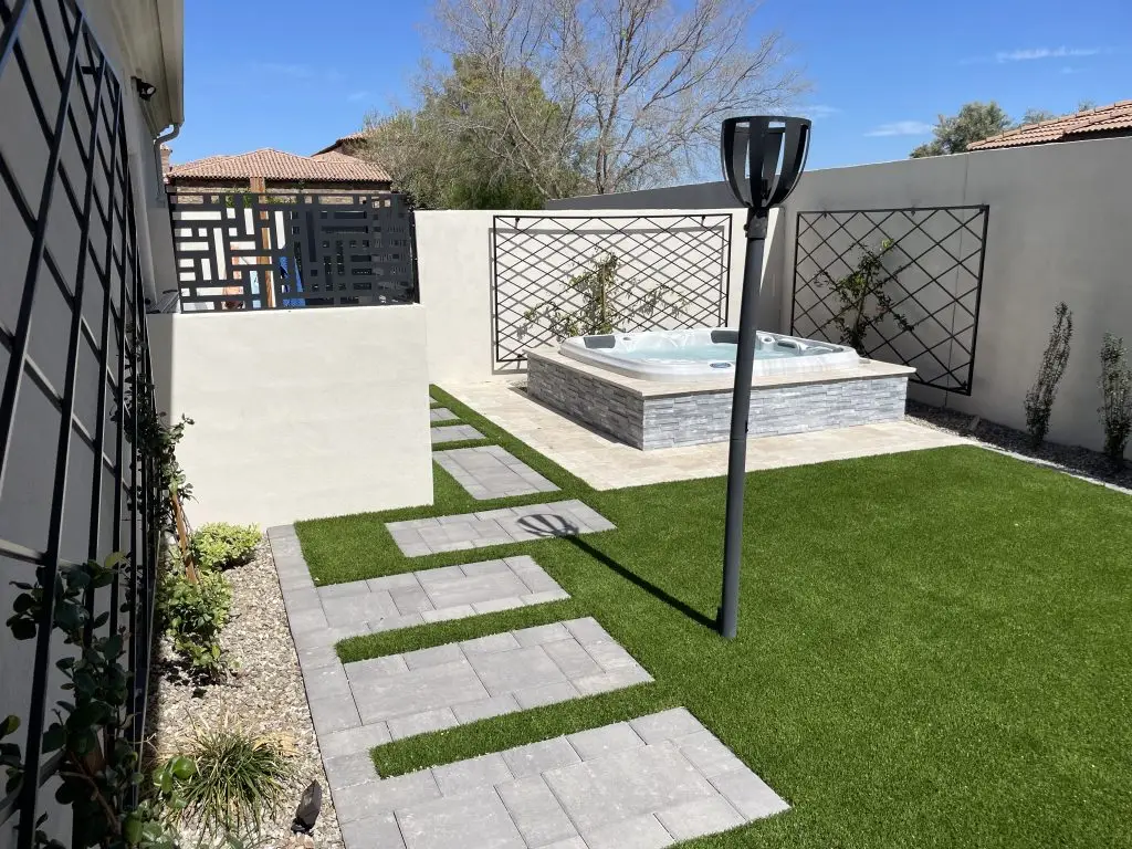 Modern yard with spa and landscaping